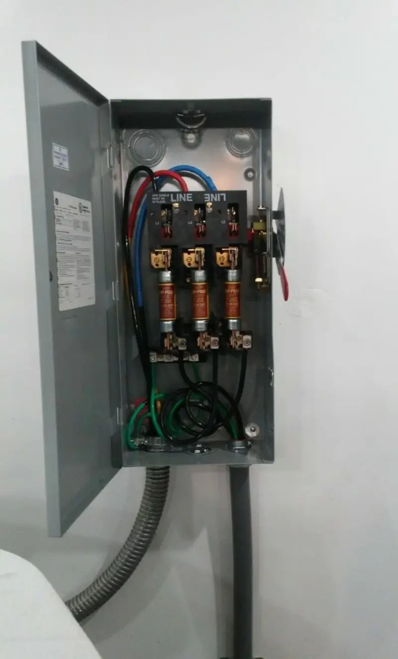 Three-phase disconnect switch installed for Smoke Detector Installation in Robeson